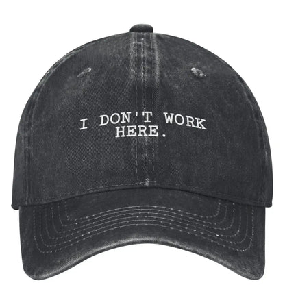 I DON'T WORK HERE Baseball Cap