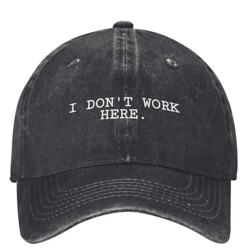 I DON'T WORK HERE Baseball Cap