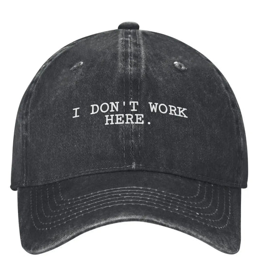 I DON'T WORK HERE Baseball Cap