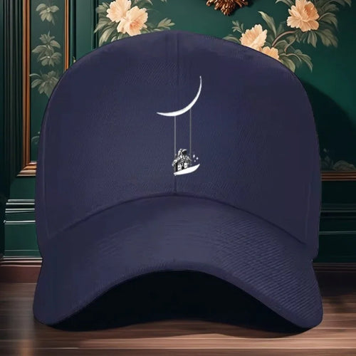 Astronaut Swinging on Moon Graphic Baseball Cap