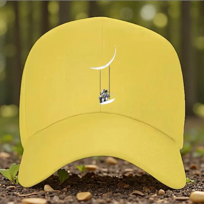 Astronaut Swinging on Moon Graphic Baseball Cap