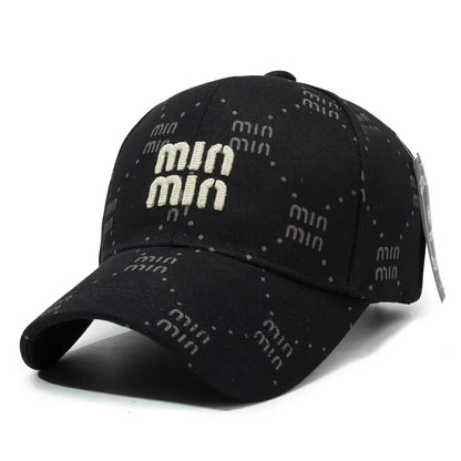 A Red Full-Lettered Baseball Cap With An Embroidered Texture