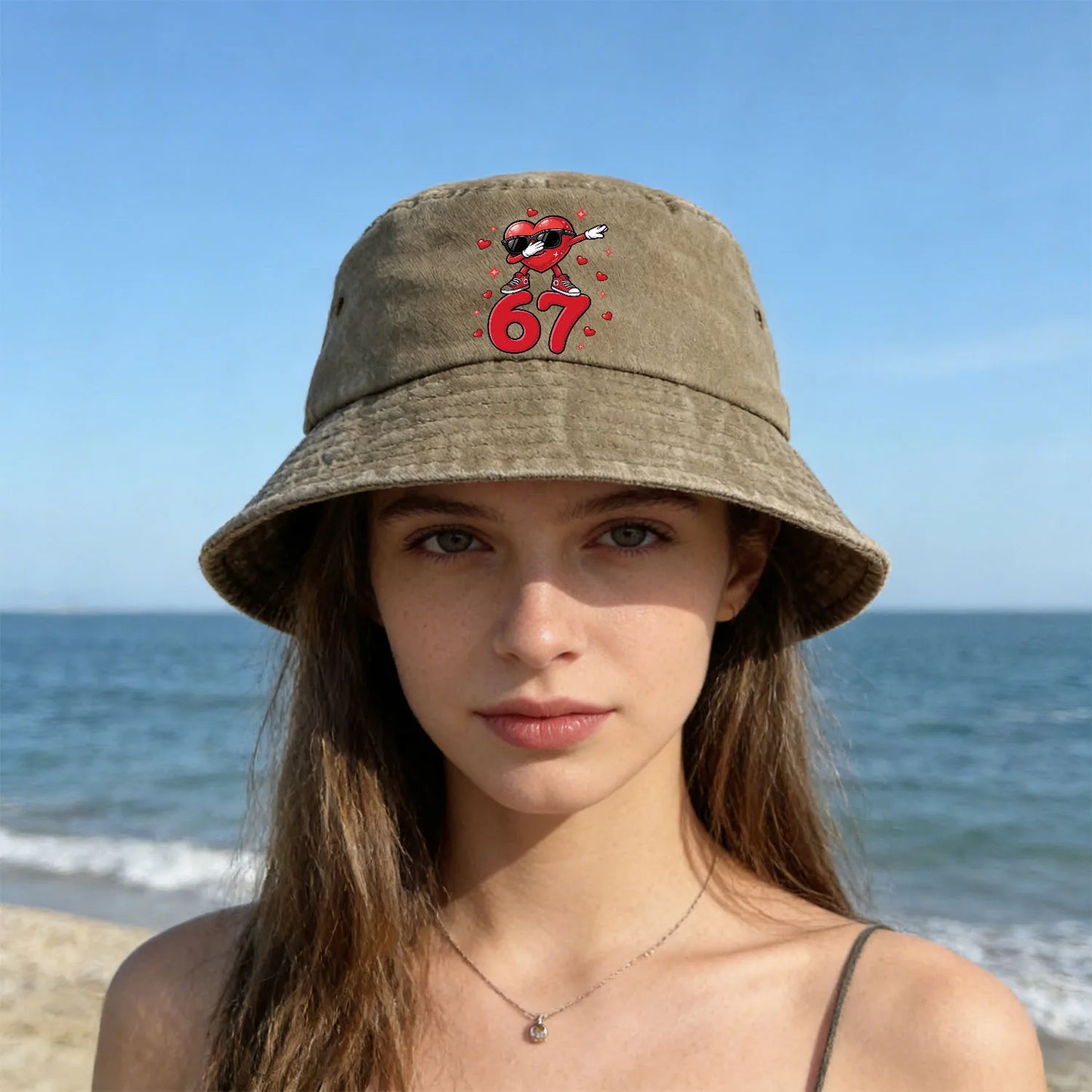 A Washed Denim Bucket Hat With A Sunglasses Heart Number